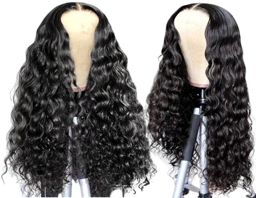 A head mannequin with a 5 x 5 deep wave closure wig installed